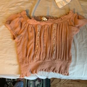 Light pink crop top size large but fits small